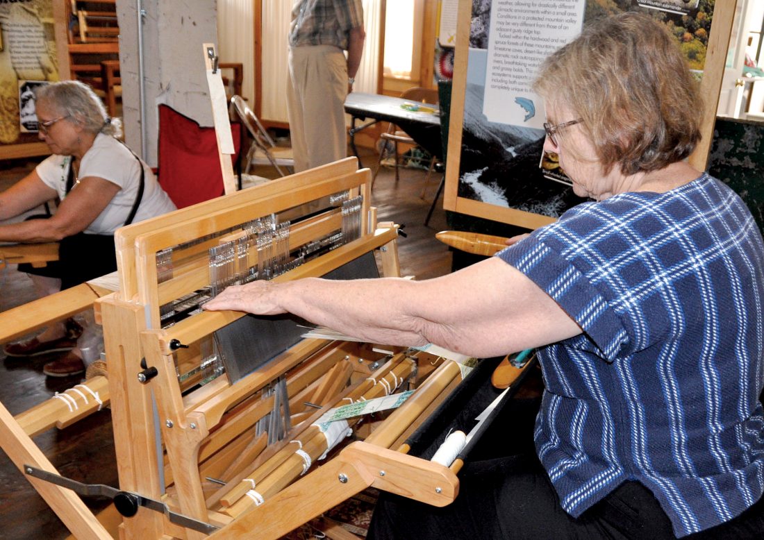 Artists and their work were displayed by Mountain Weavers Guild News